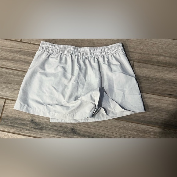 Nike Women's Sportswear Essential Mid-Rise Woven Skort - Picture 6 of 6